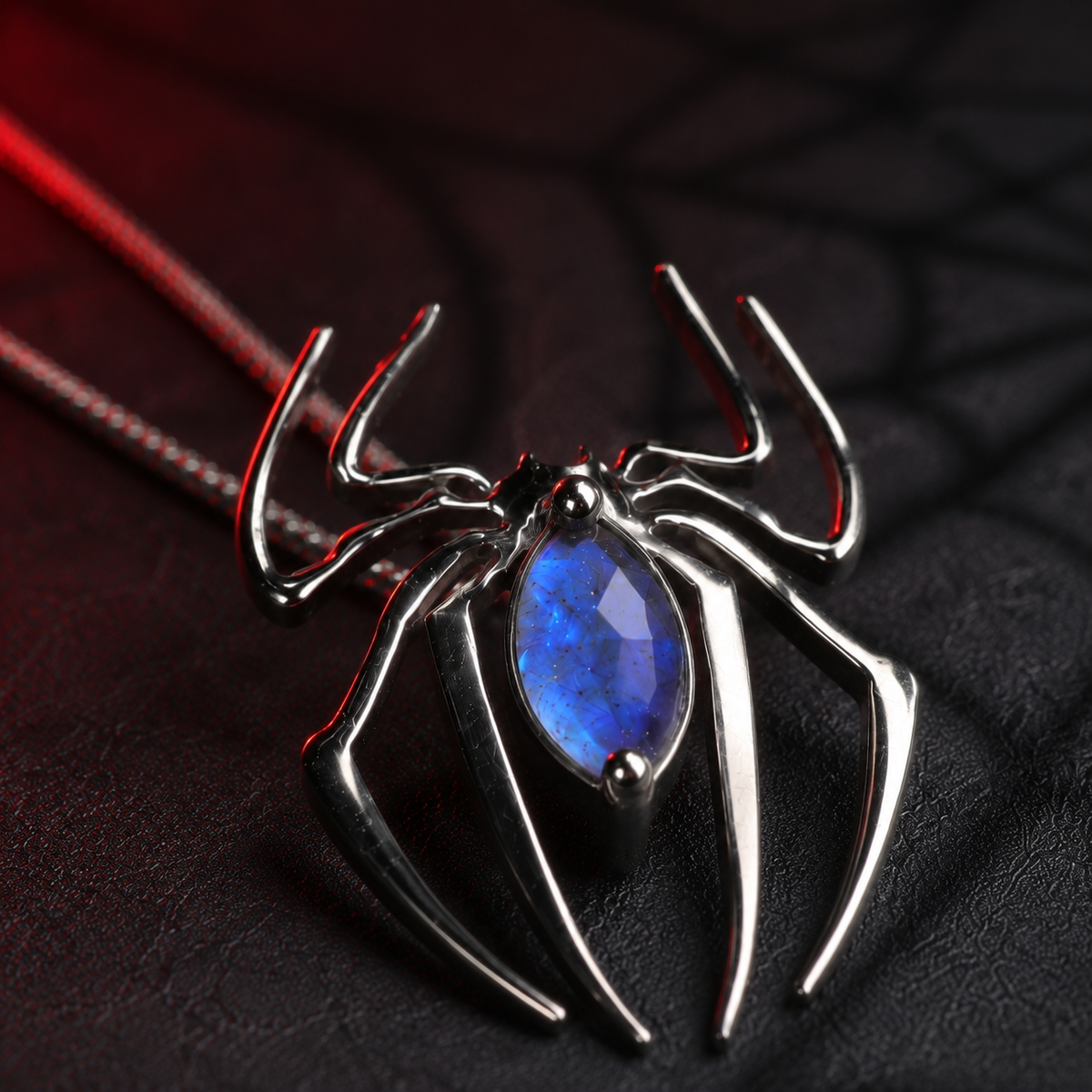 Featuring an elegant spider silhouette and a striking marquise-cut Labradorite, this unique spider pendant is perfect for lovers of gothic, witchy, mystical, and alternative jewelry.