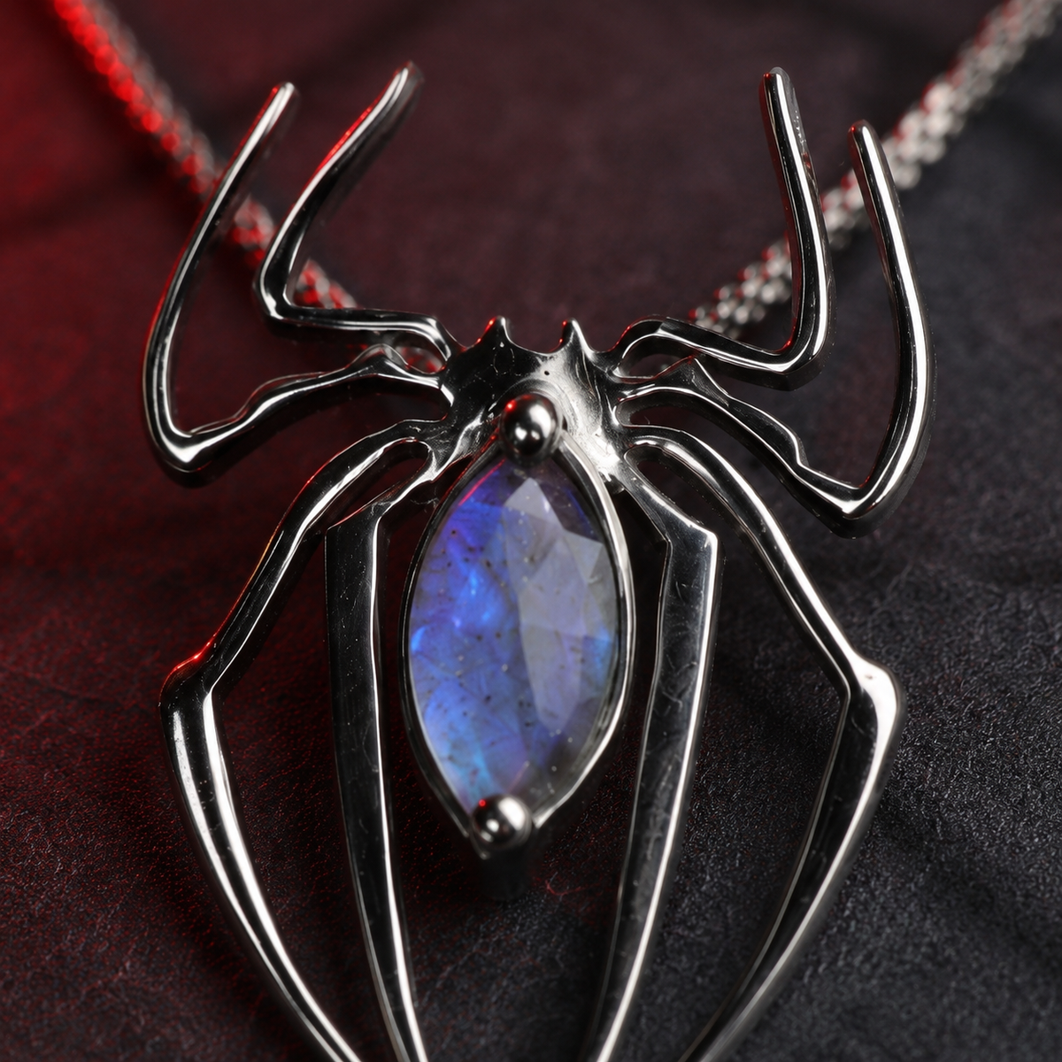 Featuring an elegant spider silhouette and a striking marquise-cut gemstone body, this unique spiderpe ndant is perfect for lovers of gothic, witchy, mystical, and alternative jewelry.