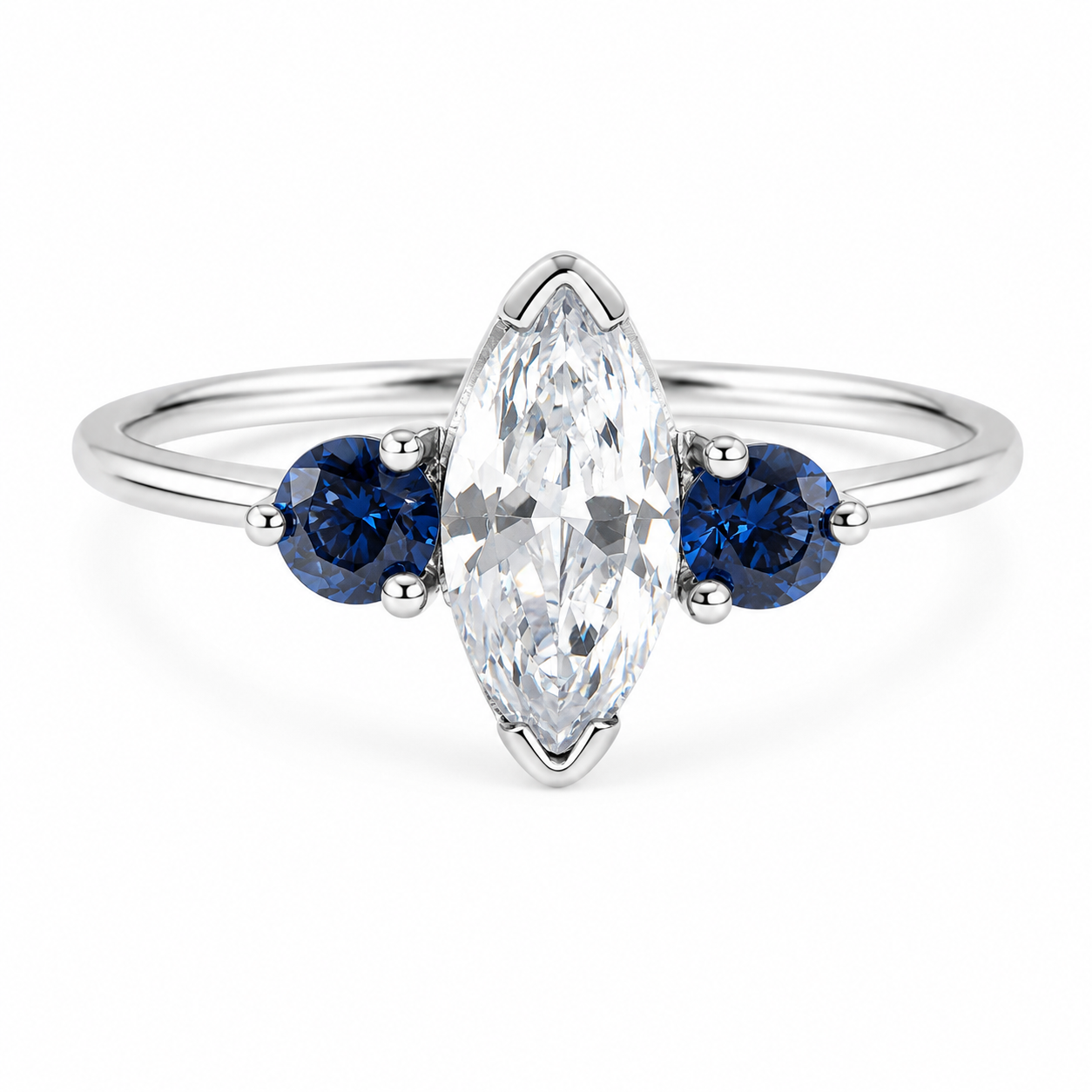 Three stone marquise CZ ring with blue sapphire accents in 925 silver