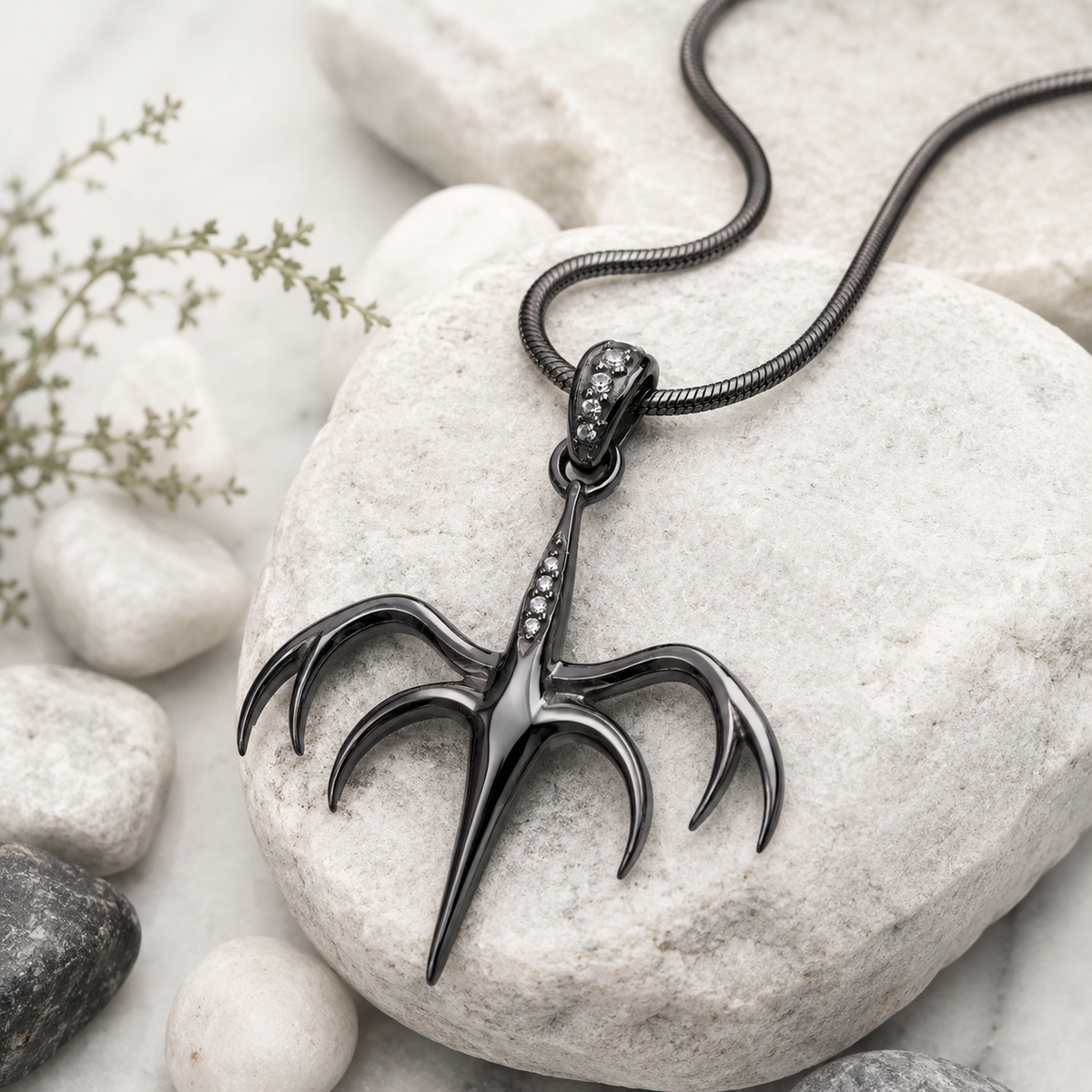 Crafted in 925 sterling silver, this unique pendant features an intricate tentacled monster design with flowing, dramatic details and Sparkling Cubic Zirconia (CZ) stones