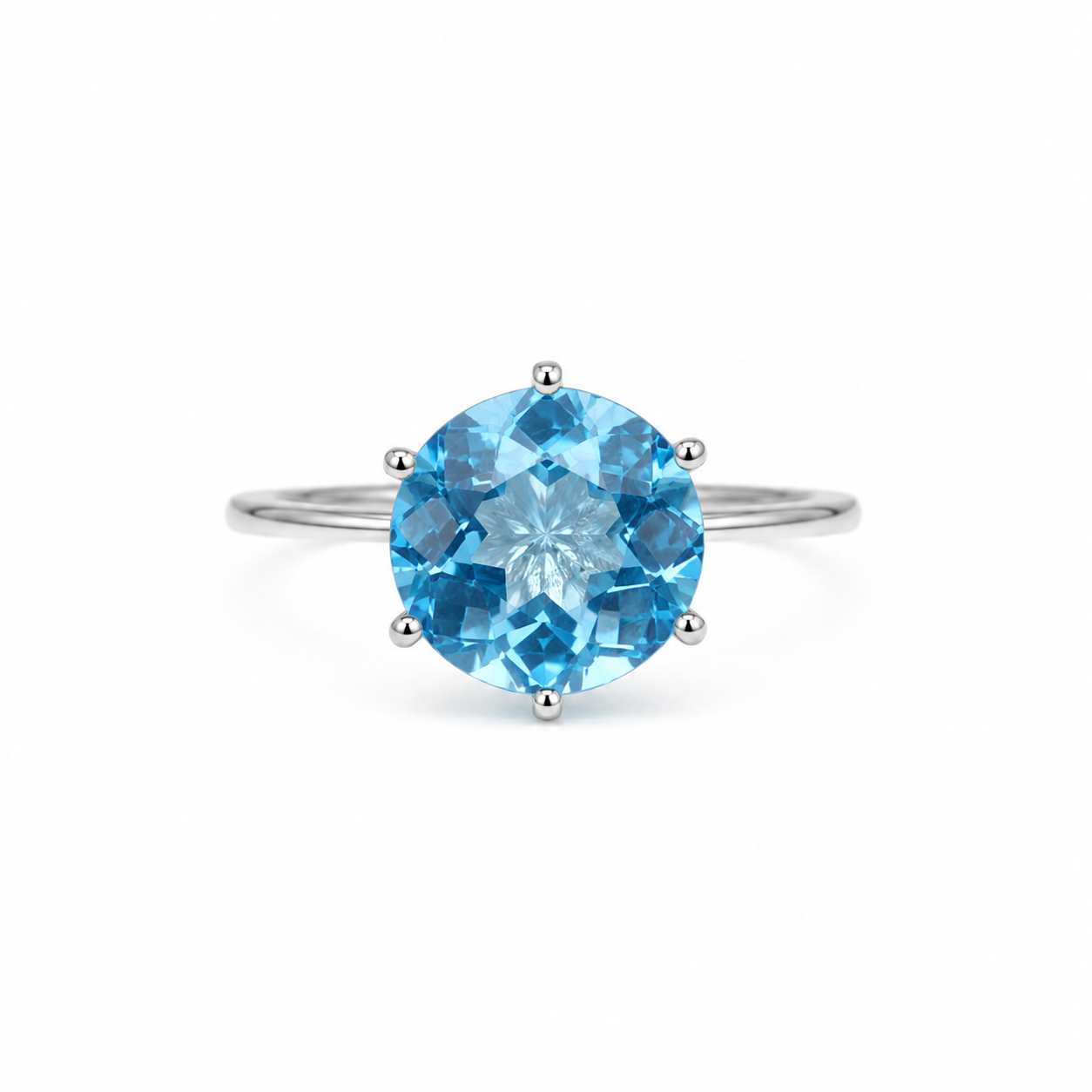 Round Swiss blue topaz solitaire ring in 925 sterling silver
