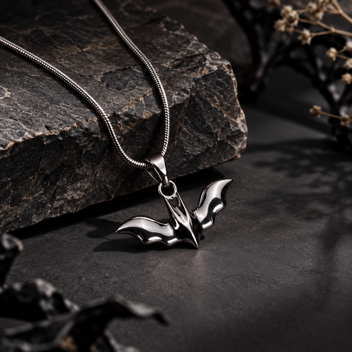 925 sterling silver Batman-inspired enamel pendant with polished finish featuring an iconic superhero bat design. Chain not included