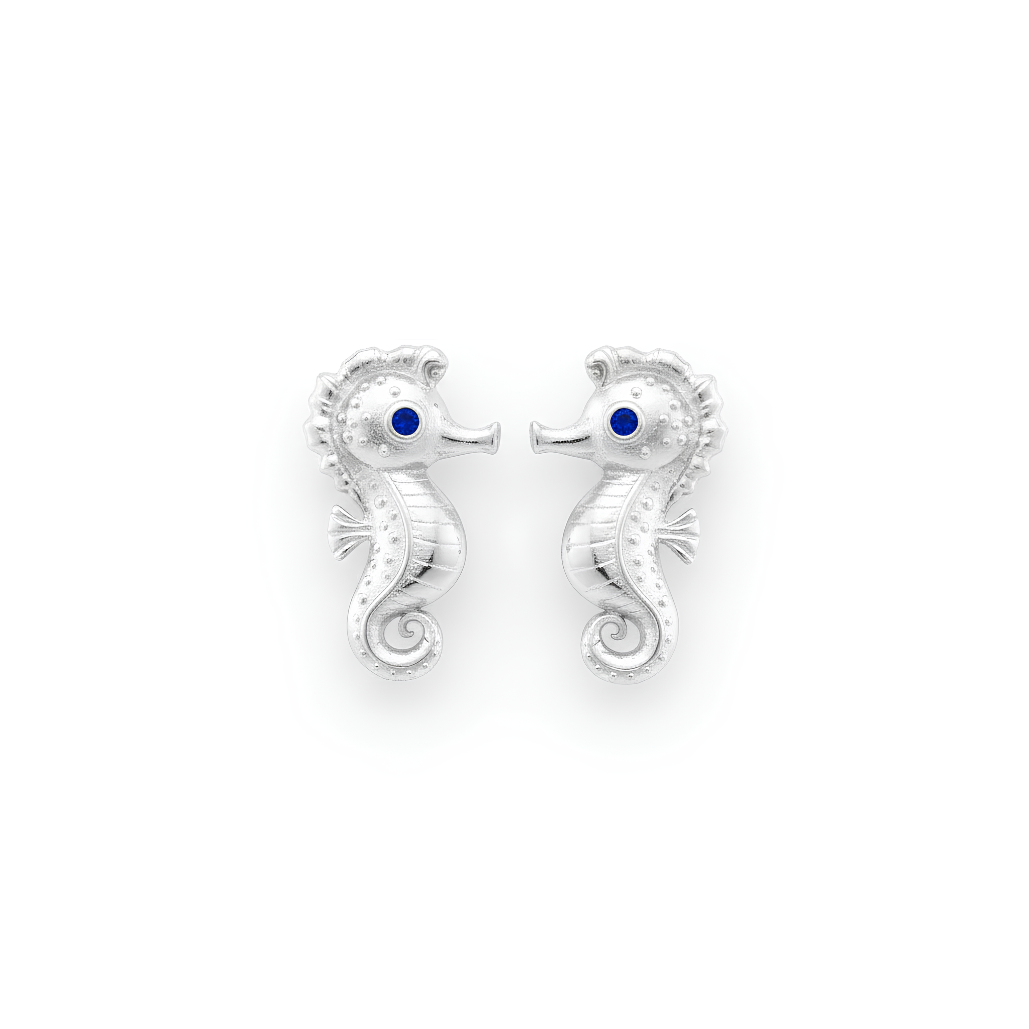 Model wearing silver seahorse stud earrings 