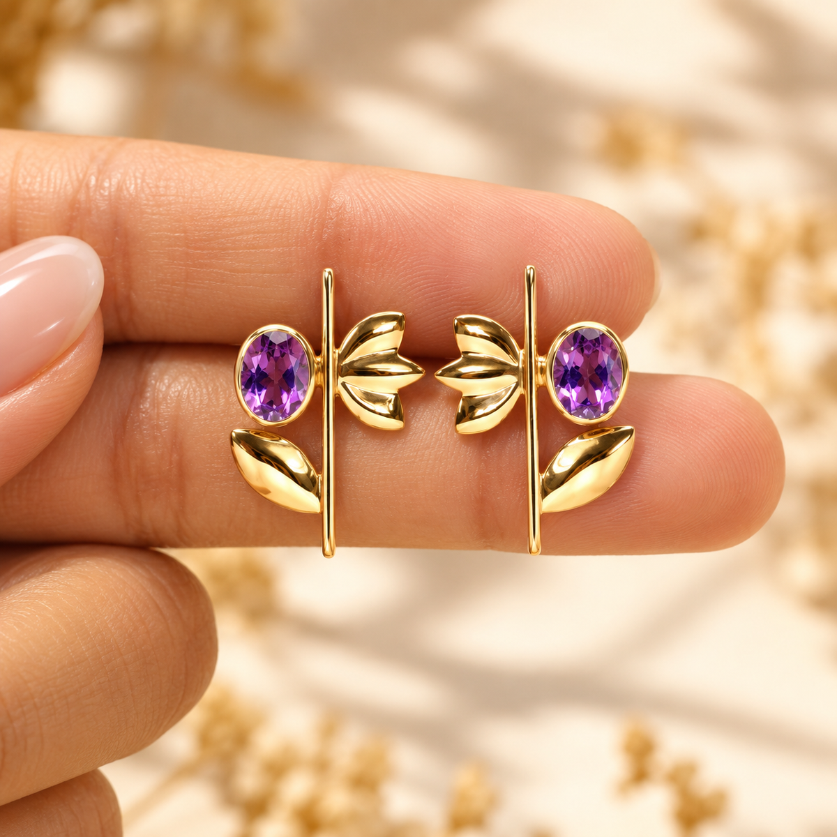 Shop purple amethyst CZ floral stud earrings in 925 sterling silver. Featuring 6x8mm oval stones and elegant lotus and leaf design. Perfect gift for her