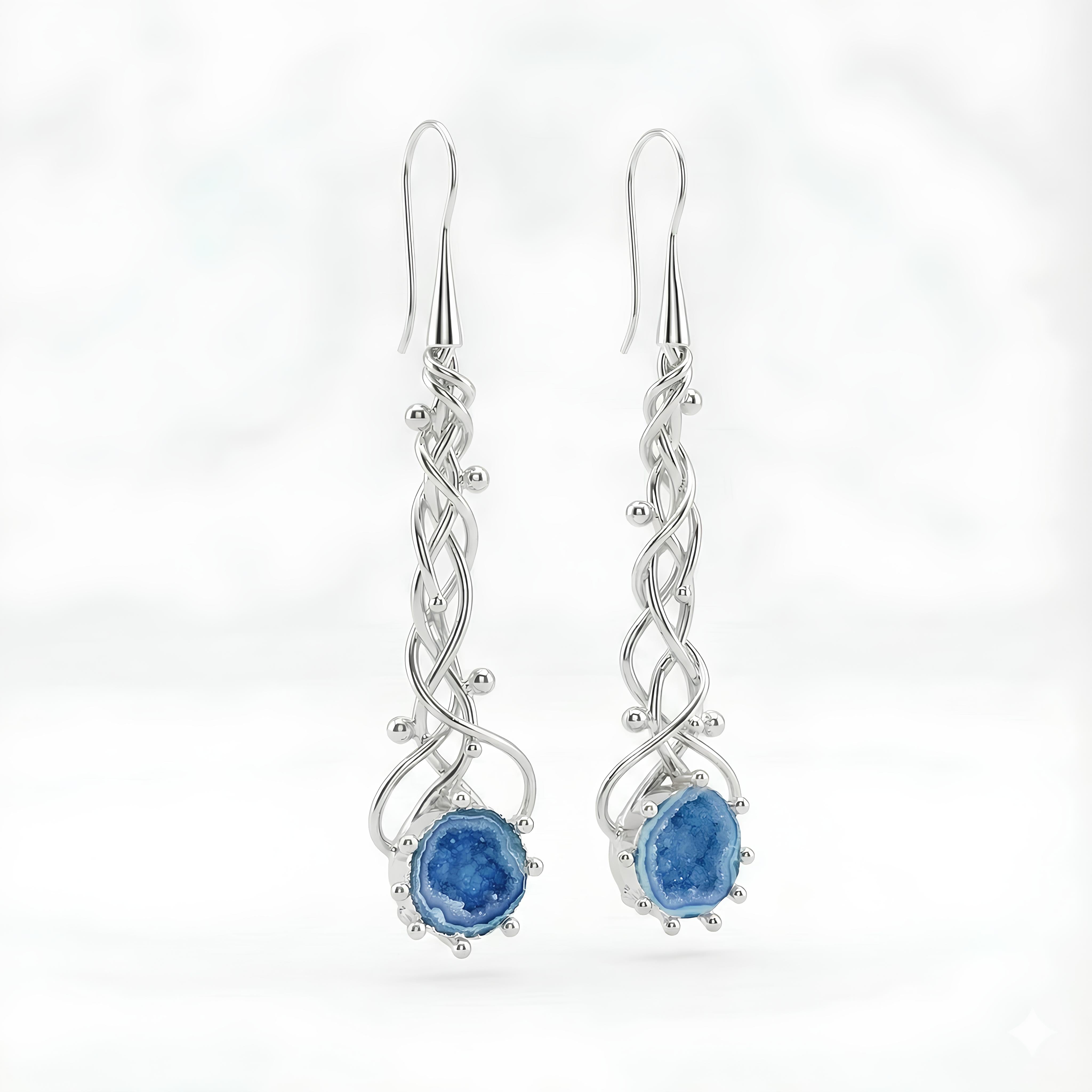 Model wearing long silver geode drop earrings