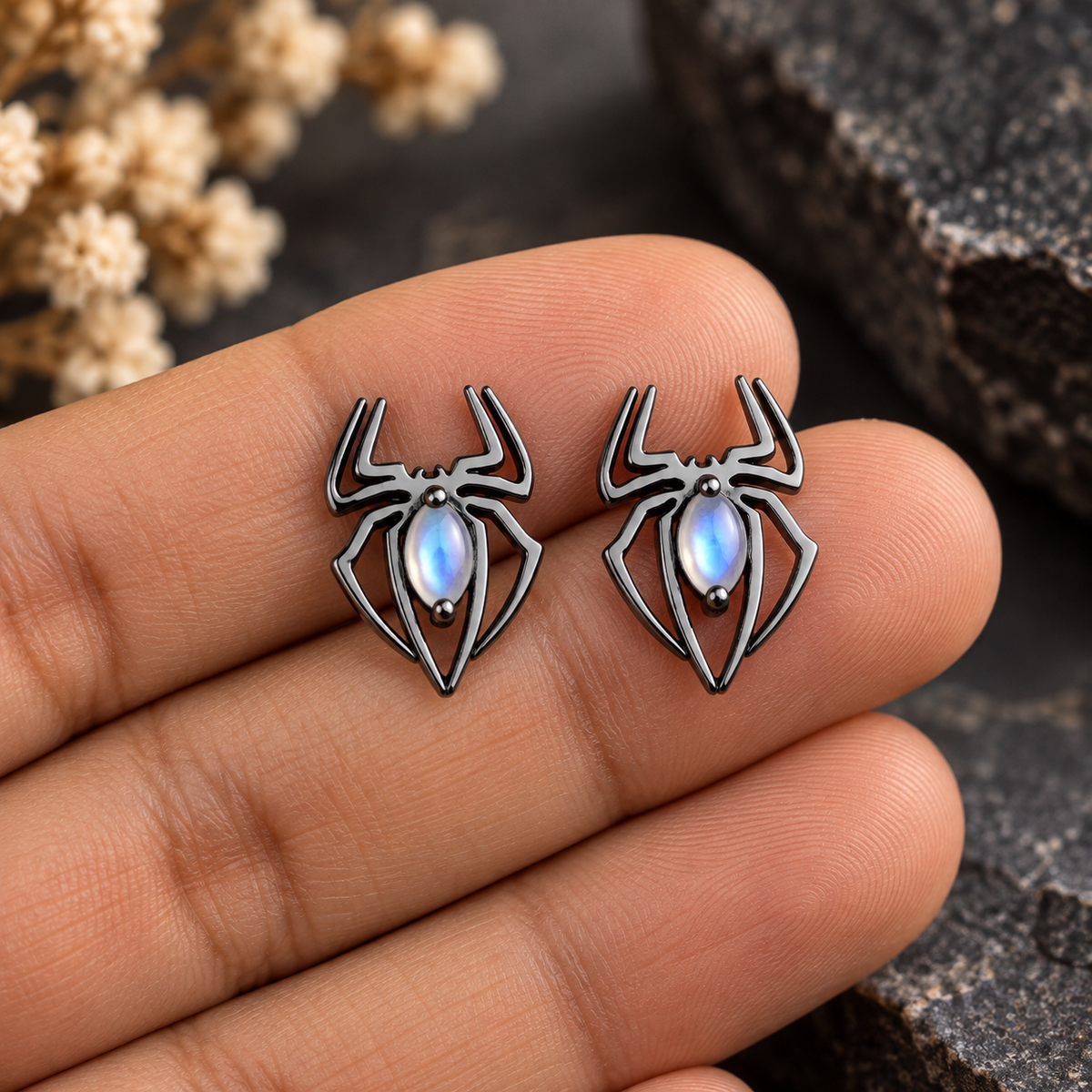 Discover 925 sterling silver spider stud earrings with black chalcedony or rainbow moonstone. 12mm gothic jewelry for men and women. Perfect Halloween gift.