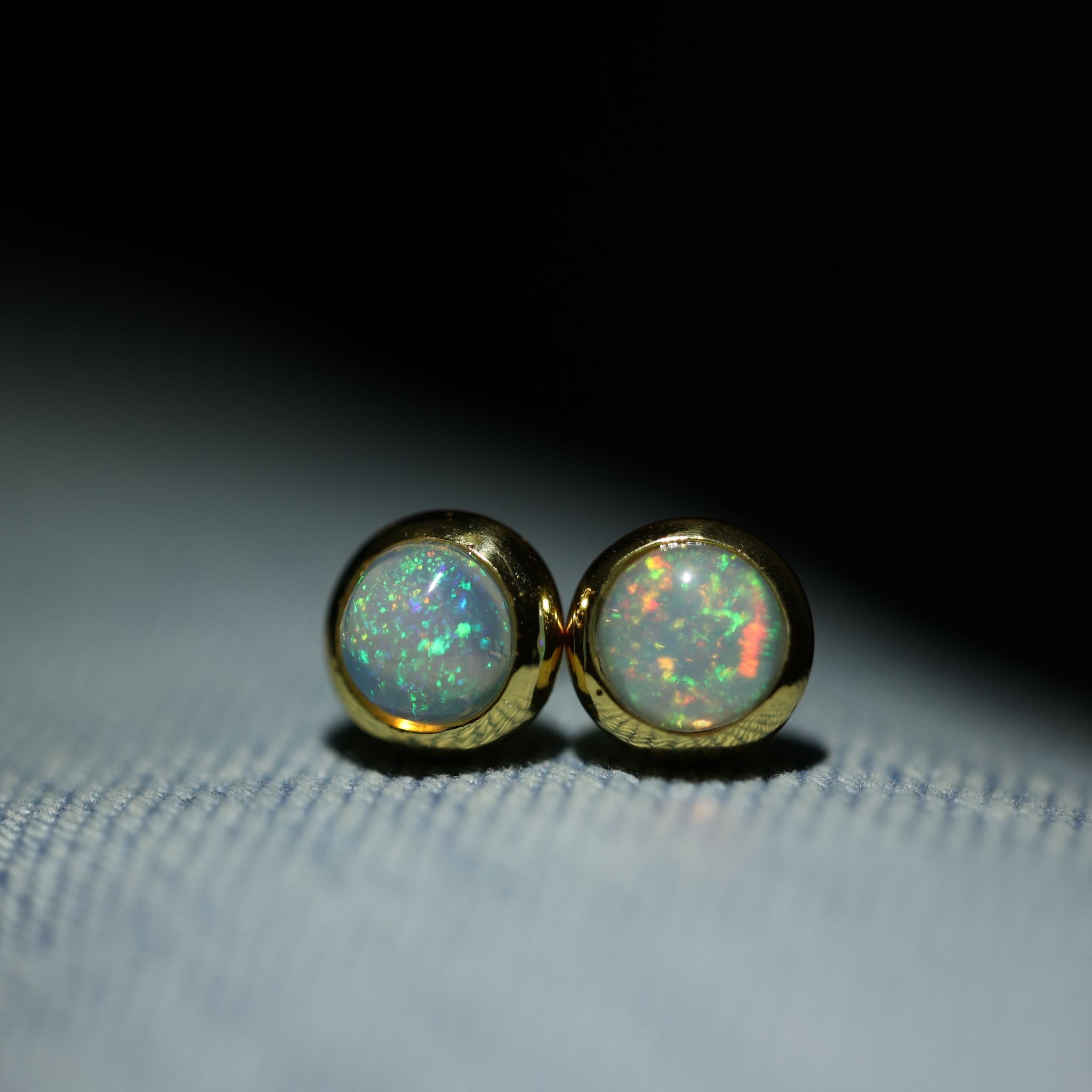 Round fire opal stud earrings in 925 sterling silver