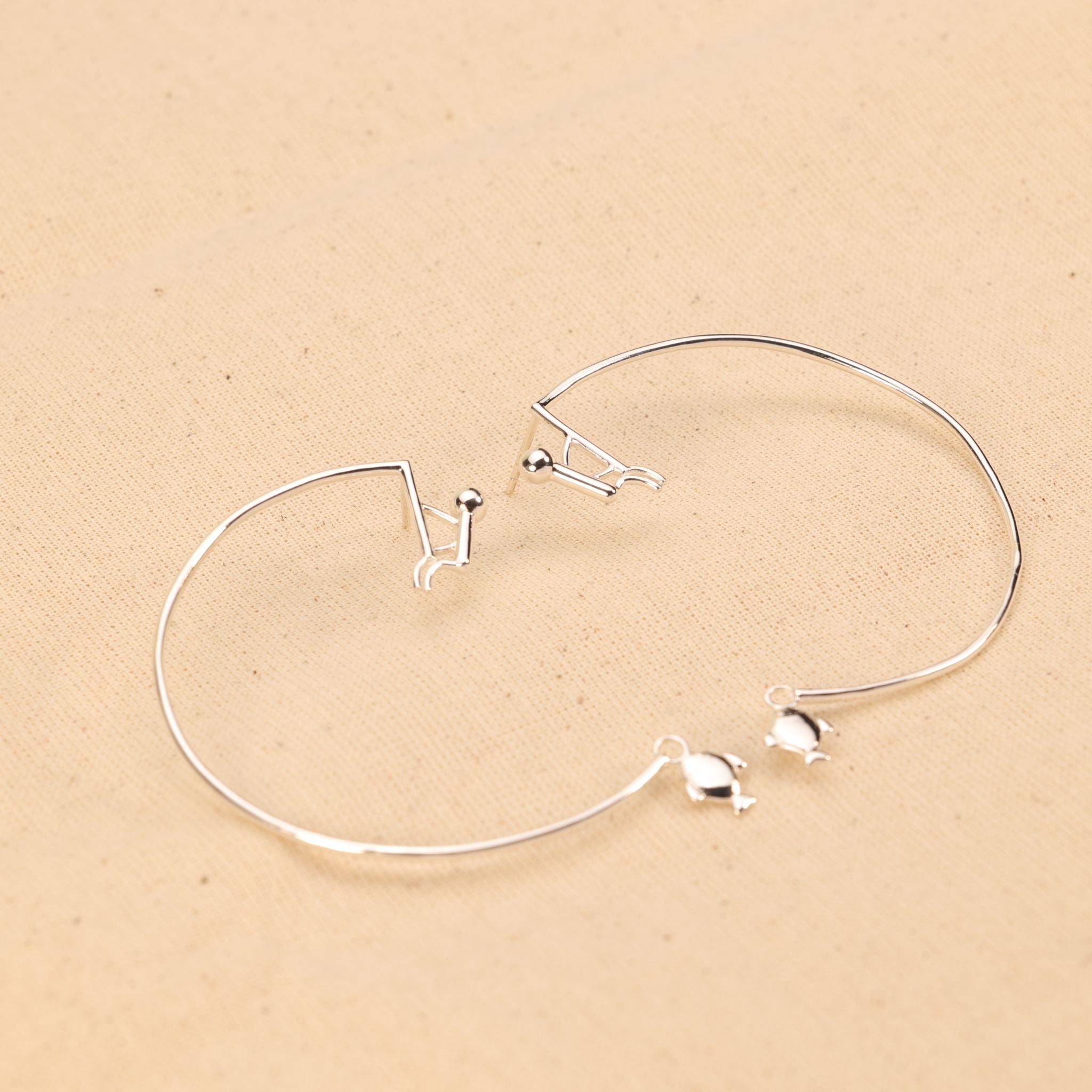 Sterling Silver Fish Catching Hoop Earrings