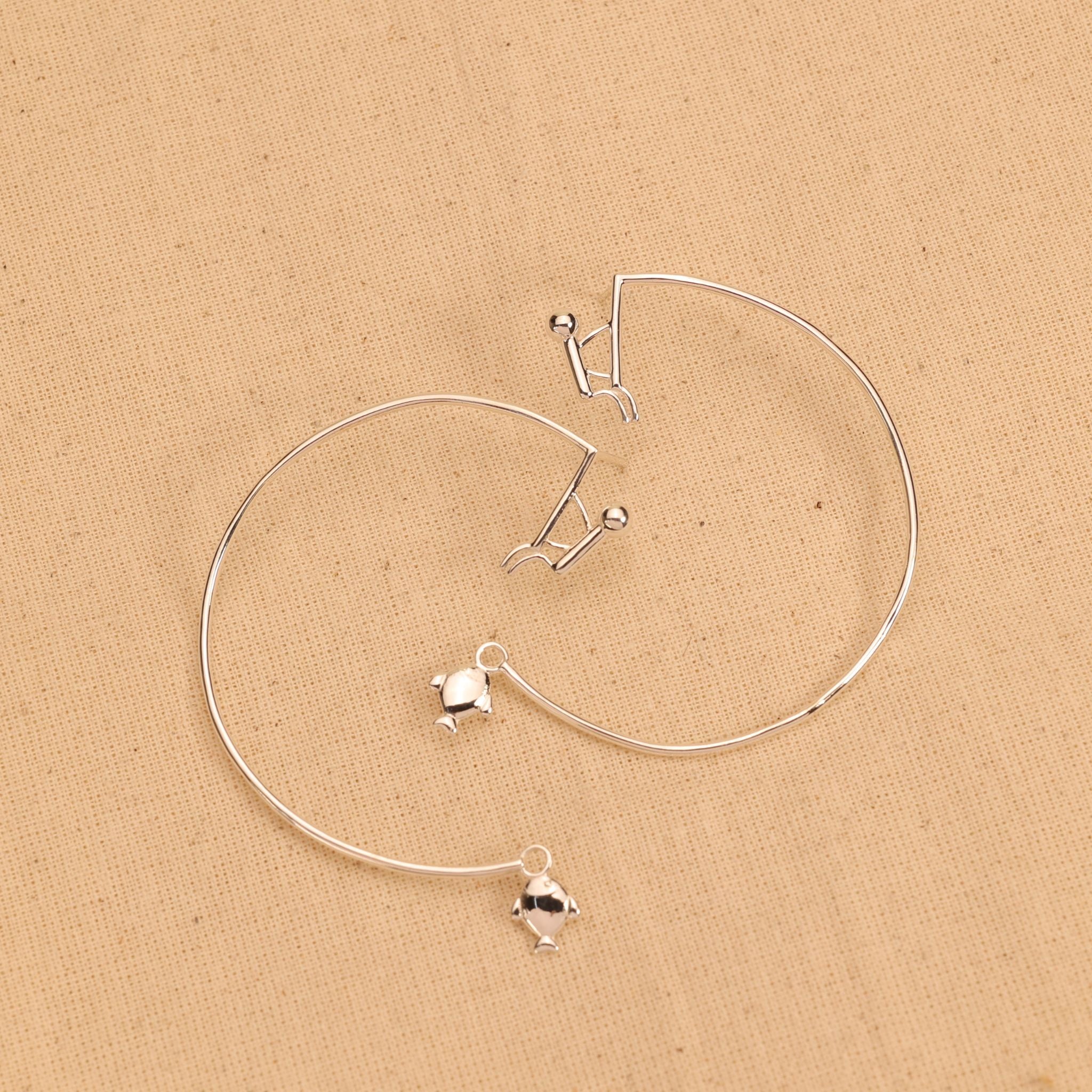 Sterling Silver Fish Catching Hoop Earrings