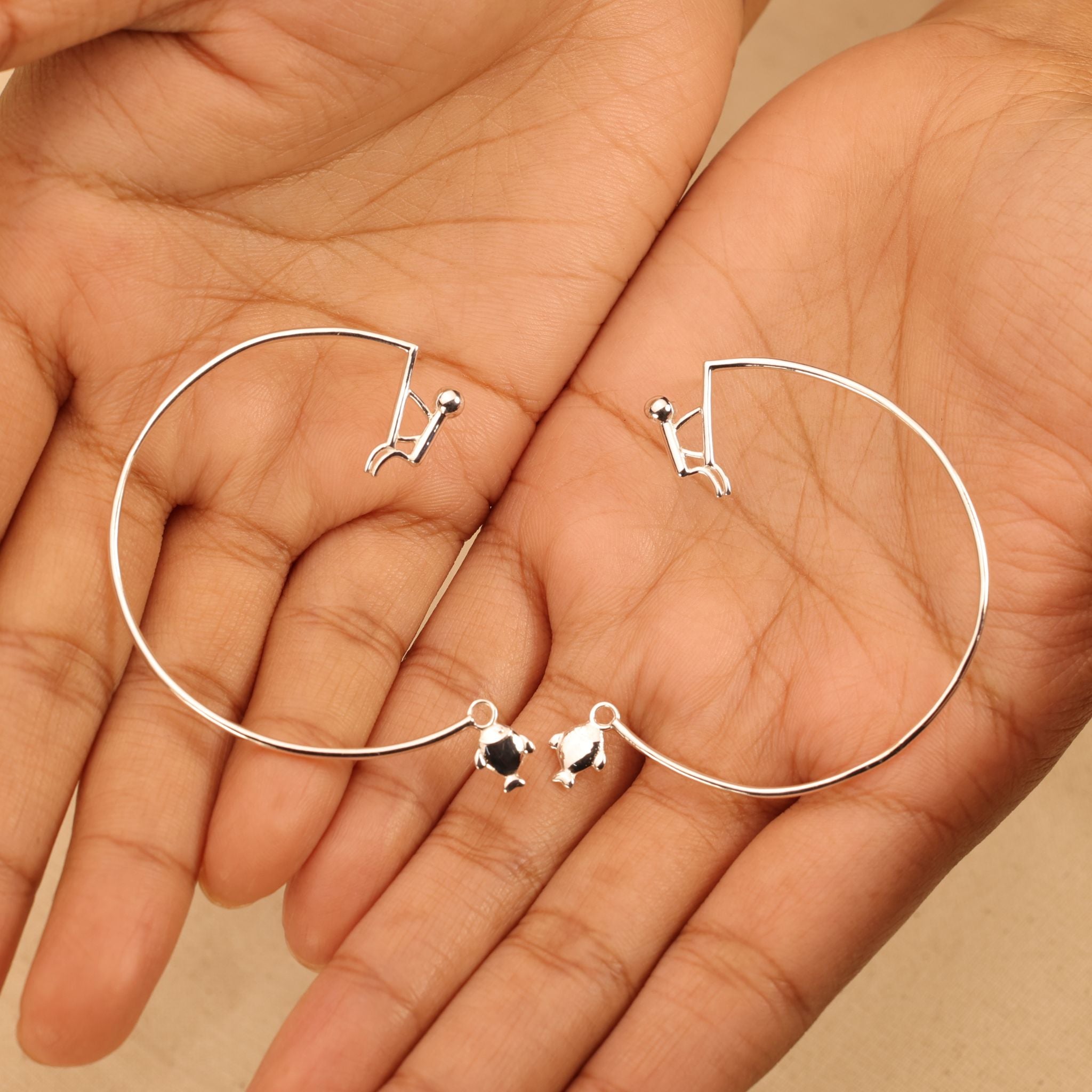 Sterling Silver Fish Catching Hoop Earrings