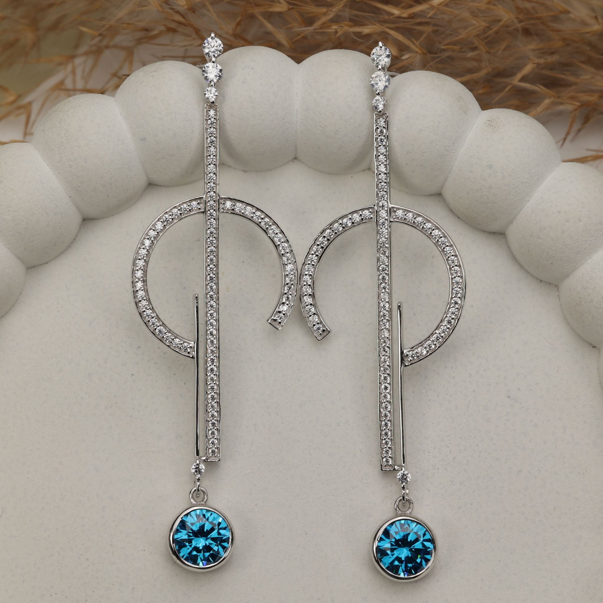 925 sterling silver geometric drop earrings featuring pavé cubic zirconia bars with round Swiss Blue Topaz CZ dangles