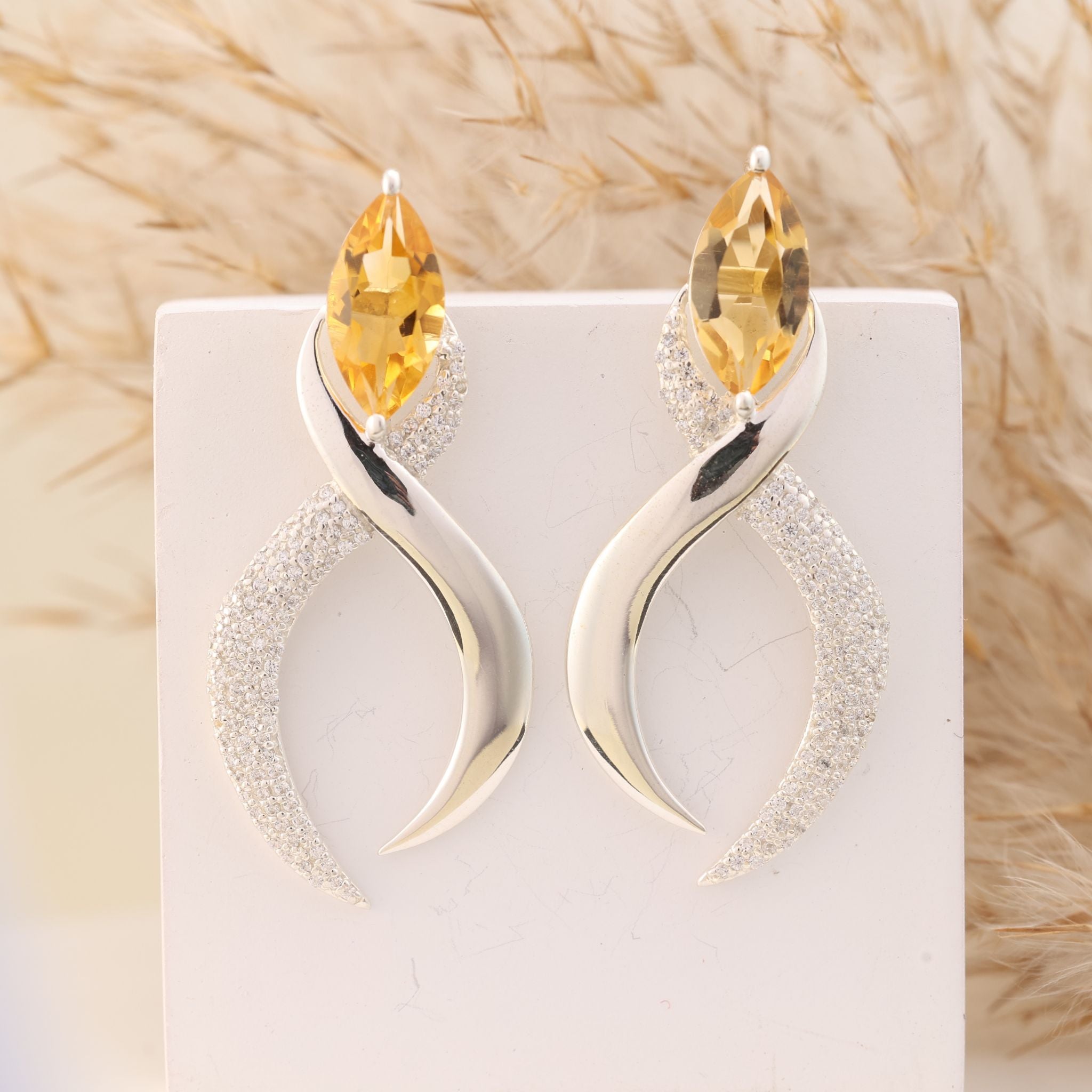Citrine and CZ swirl drop earrings crafted in 925 sterling silver