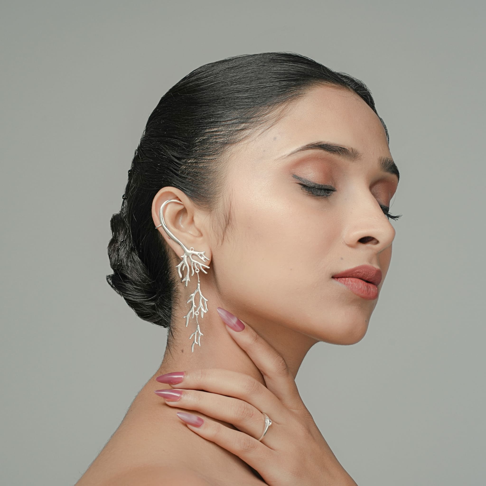 Model wearing 925 silver detachable tree branch ear cuff with dangle