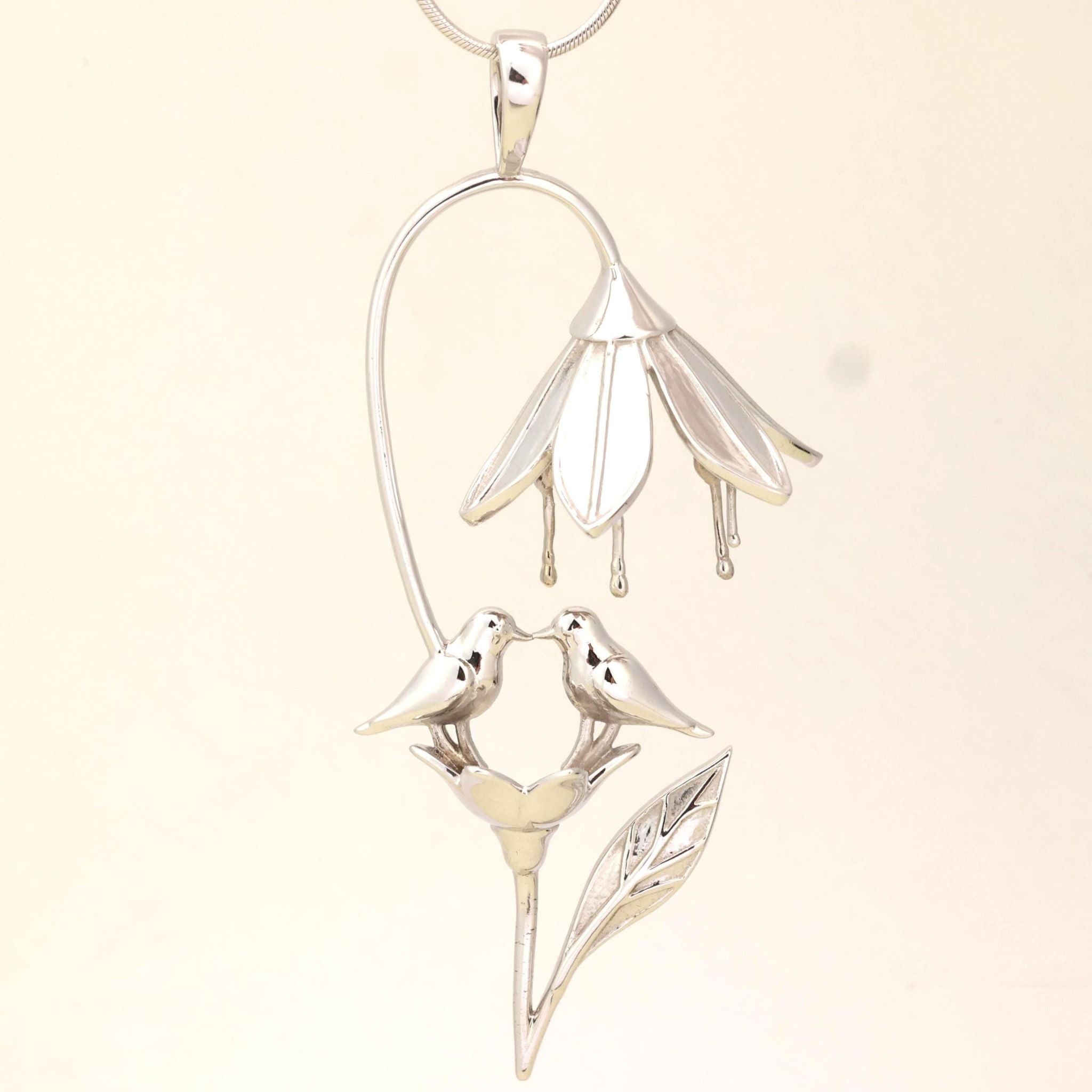 Love birds flower pendant in solid 925 sterling silver featuring two perched birds inside an elegant floral design, handcrafted nature-inspired jewelry, chain not included