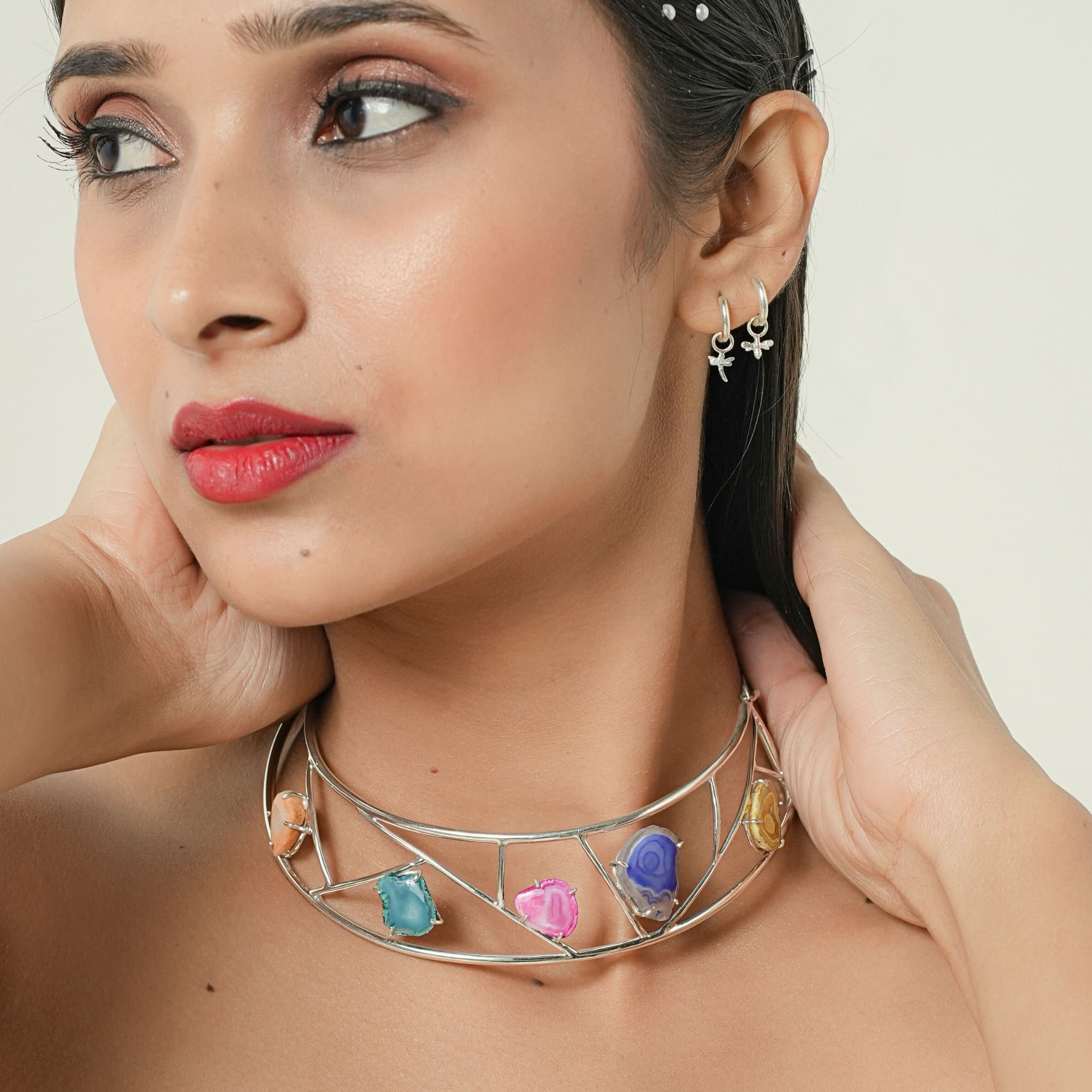 Model wearing multi agate slice silver choker
