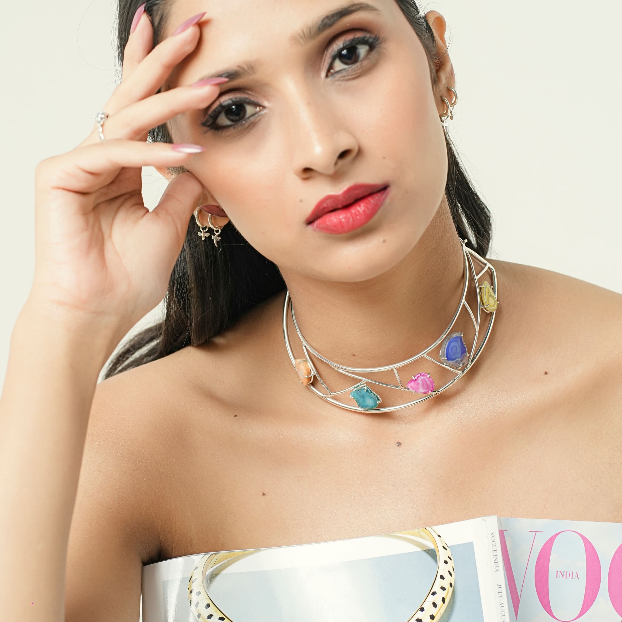 Model wearing multi agate slice silver choker
