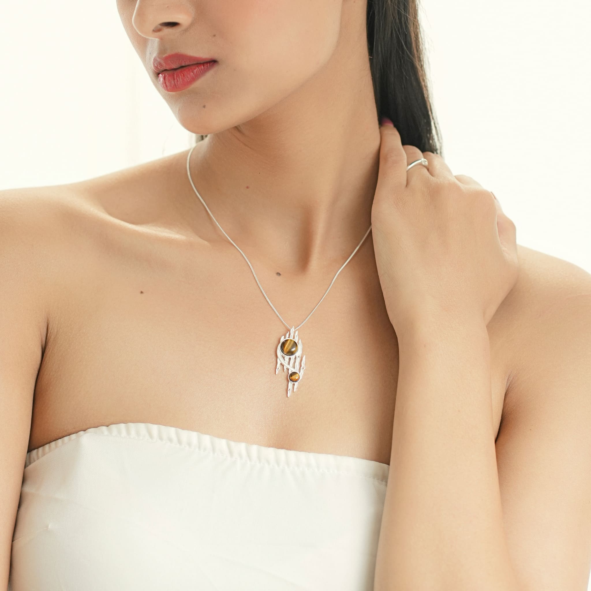 Model wearing silver Lord of the Rings pendant