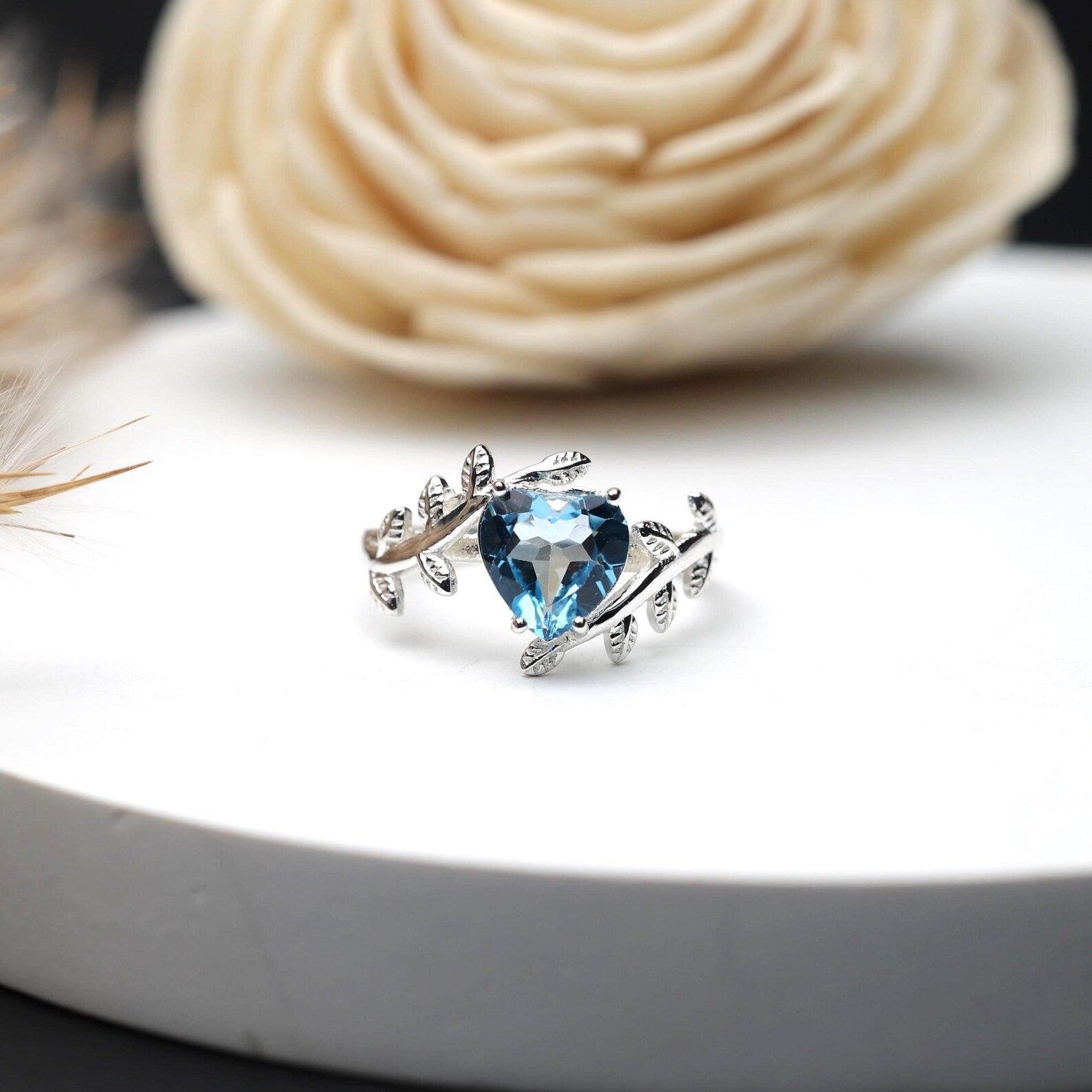Blue topaz leaf vine ring